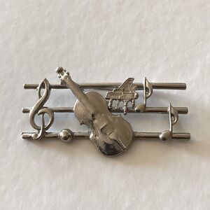 1980s Musical note metal brooch
